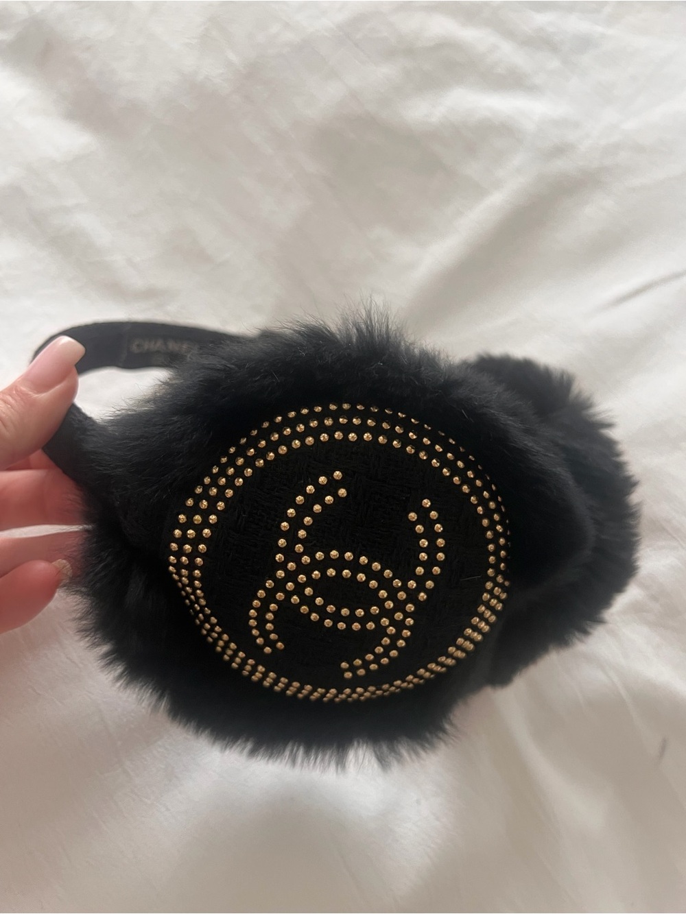 CHANEL Black Fur Ear Muffs with Gold Crystal Logo